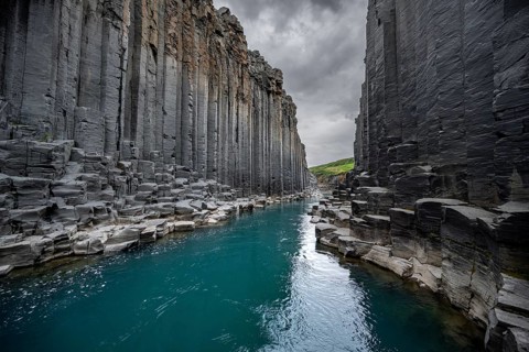 Stuðlagil Canyon, turquoise river between basalt columns, Egilsstadir, Iceland, Europe