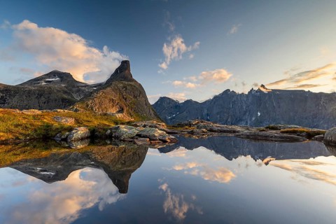 Romsdalshornet mountain reflected in mountain lake, Åndalsnes, Møre og Romsdal, Norway, Europe