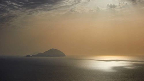 Santa Marina Salina, sunrise, sun rises behind Panarea, Salina, Aeolian Islands, Sicily, Italy,