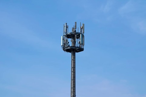 Mobile phone mast, transmission mast in front of sky, Hesse, Germany, Europe