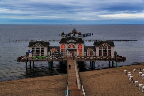 Pedestrians on the pier Sellin at dusk, view from above, long exposure, Baltic resort Sellin, Insel