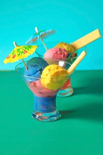 Homemade ice cream in glass bowls with waffle and umbrella, Summer, Germany, Europe