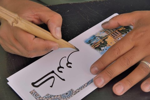 Calligrapher at work, Marrakesh, Marrakesh-Tensift-El Haouz region, Morocco, Africa