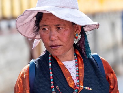 Tibetan woman, pilgrim in Xigaze, Tibet, China, Asia