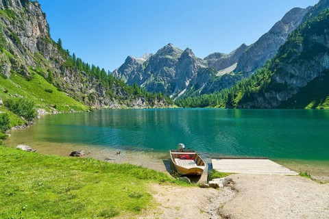 Boat at Tappenkarsee, mountain lake, Wildkarhöhe and Stierkarkopf, Radstätter Tauern, landscape