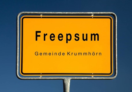 Place name sign for Freepsum, a village in the municipality of Krummhörn in the district of Aurich