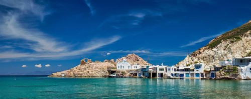 Panorama of the beach and fishing village of Firapotamos in Milos island, Greece, Europe