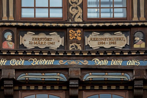 Façade detail on Wedekindhaus, historic half-timbered house in Renaissance style on the market