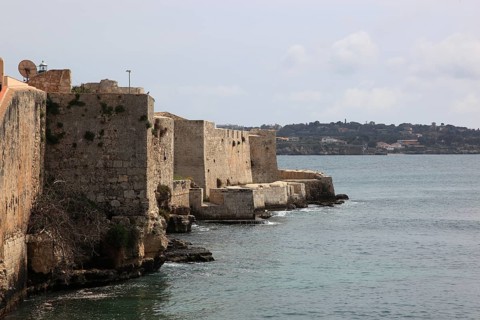Ortygia or Ortigia is the historic centre of the city of Syracuse, the walls of the Castell by the