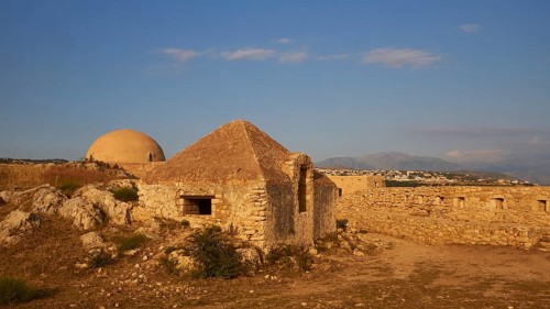 Fortezza, Venetian sea fortress, building inside the fortress, blue sky, few grey-white clouds,