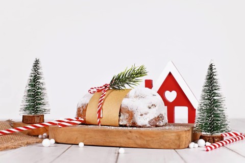 German Stollen cake, a fruit bread with nuts, spices, and dried fruits with powdered sugar