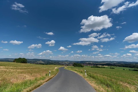 View of Franconian Switzerland, road leading to Markt Eckental, Middle Franconia, Bavaria, Germany,