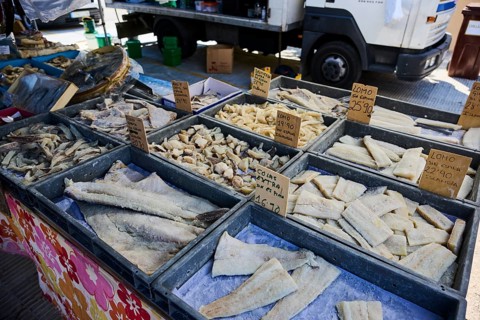 Market stall with dried fish on a weekle market near Tarragona, Catalonia, Spain, Europe