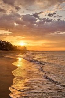 Sunrise with morning colors on a sandy beach near Tarragona, Catalonia, Spain, Europe