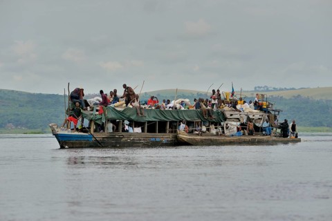 Overloaded boat on the Congo River, near Tshumbiri, Bandundu Province, Congo, Africa