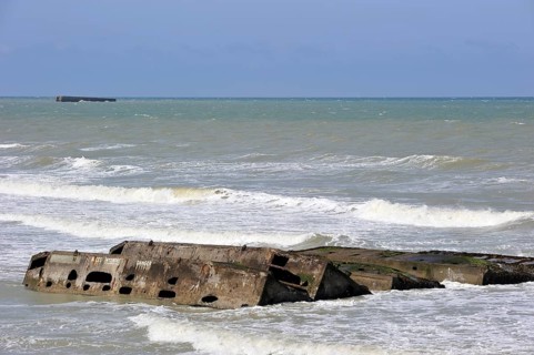 Concrete boxes, known as Phoenix Caissons, in the sea were used as breakwaters and to form an
