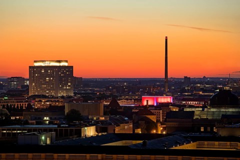 Charité high-rise hospital and the chimney of the Vattenfall combined heat and power plant