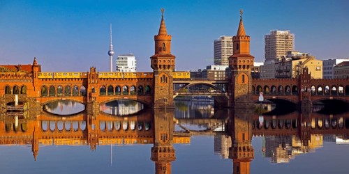 Oberbaum Bridge over the Spree with yellow underground and television tower,