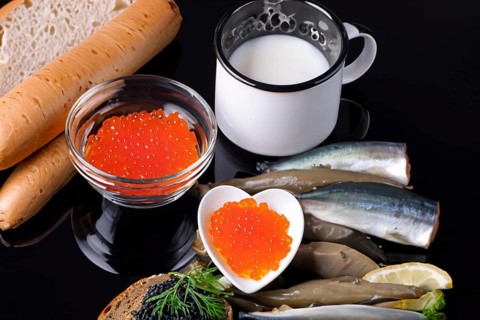 Different kinds of caviar with bread and beverages, AI generated