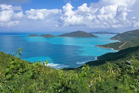 Seascape showing islets and azure-blue water on the north side of the island Tortola, British
