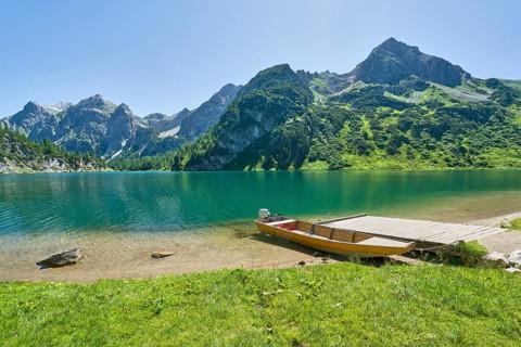 Boat at Tappenkarsee, Raucheck and Wildkarhöhe, alpine pasture, mountain lake, Radstätter Tauern,