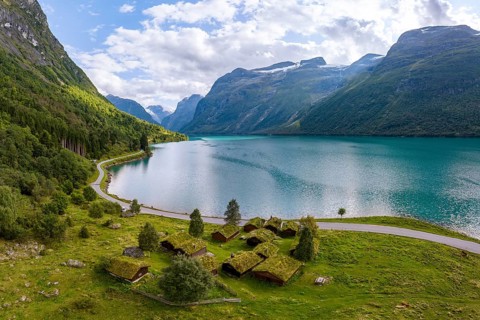 Traditional cabins on the shores of Lake Lovatnet, Breng seter, Loen, Stryn, Norway, Europe