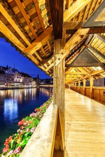 Chapel Bridge town on the river Reuss with bridge at night in Lucerne, Switzerland, Europe