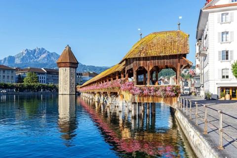 Lucerne city on the river Reuss with Chapel Bridge and Mount Pilatus in Lucerne, Switzerland,