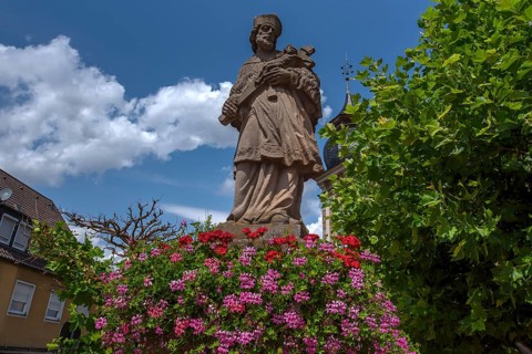 Market fountain with the figure of Saint Nepomuk, Eltmann, Lower Franconia, Bavaria, Germany,