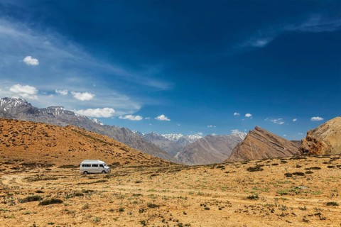 Car in Himalayan landscape. Spiti Valley, Himachal Pradesh, India, Asia