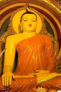 Large Buddha statue at Gangaramaya Temple, Colombo, Sri Lanka, Asia