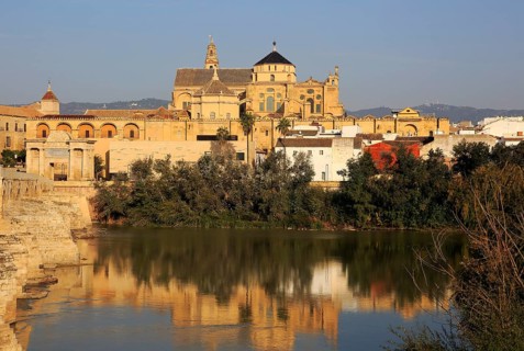 River Rio Guadalquivir and historic Mezquita cathedral buildings, Great Mosque, Cordoba, Spain,