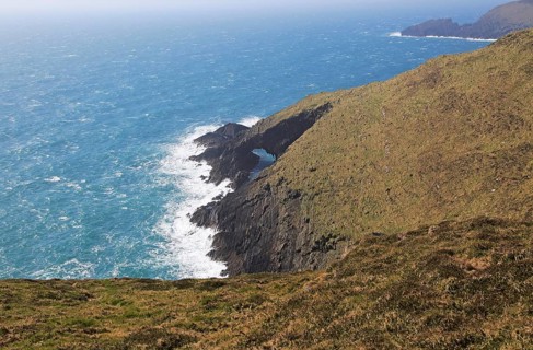 Natural arch in cliffs, Cape Clear Island, County Cork, Ireland, Irish Republic, Europe