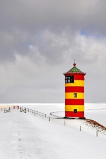 Pilsum lighthouse in winter, East Frisia, Lower Saxony, Federal Republic of Germany