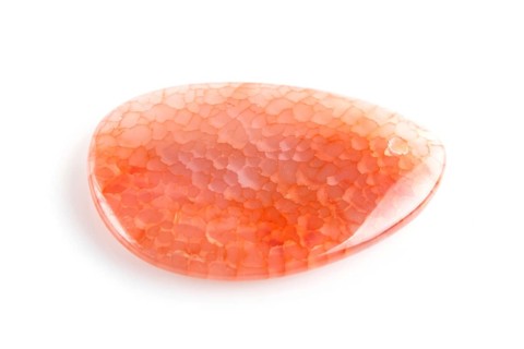 Colored onyx pendant isolated on white background, close up
