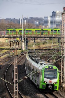 Tram line 112 on bridge, S-Bahn train on railway line between Mülheim an der Ruhr, in the