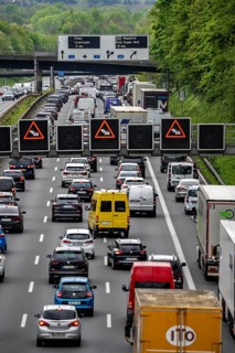 The A3 motorway, heavy traffic on 8 lanes, including the temporarily open hard shoulder, in front