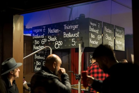 Bratwurst stand at the Christmas market Weihnachtszauber Gendarmenmarkt. The Christmas market at