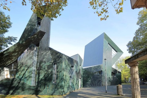 New synagogue built in 2010, Magenza, modern building and pillar of old destroyed building,