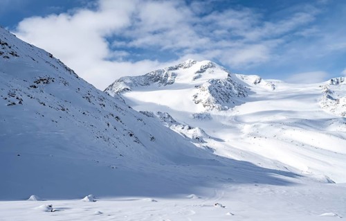 Snow-covered mountain landscape, mountain peak Monte Cevedale and glacier Zufallferner and