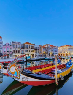 Traditional Moliceiro boats on Aveiro main canal, Aveiro, Portugal, Europe