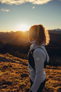 Trail running in autumn on the Jochberg on Lake Walchensee against the wonderful backdrop of the