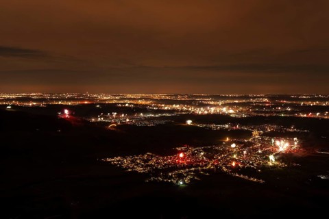 New Year's Eve fireworks 2023 at Breitenstein near Ochsenwang. View from the Swabian Alb to