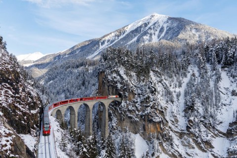 Rhaetian Railway train at the famous Landwasser Viaduct on the Albula railway Stadler Rail