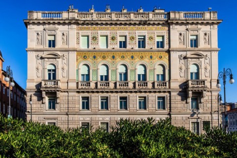 Palazzo del Governo with oriental-looking golden mosaic tiles, Piazza Unità d'Italia in the heart