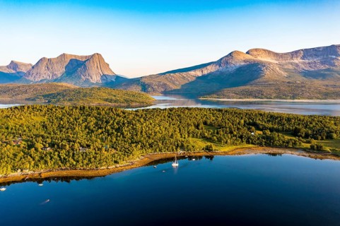 Aerial view over the fjord Efjord south of Narvik, seen at sunset, leisure boats anchor, holiday
