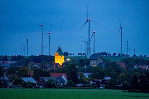 Wind farm above the village of Lichtenau, self-proclaimed energy town, houses with photovoltaic