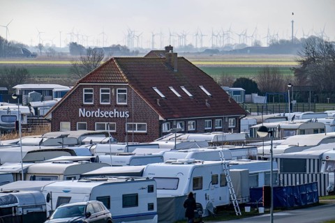Campsite, pitch for caravans and motorhomes on the North Sea dyke, in Neuharlingersiel, Lower