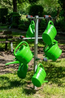 The North Cemetery in Essen-Altenessen, watering cans, North Rhine-Westphalia, Germany, Europe
