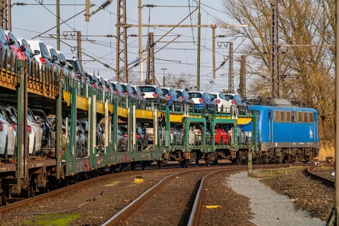 VW plant, Emden, new cars, car transporter, car train, goods train, with VW vehicles, Lower Saxony,